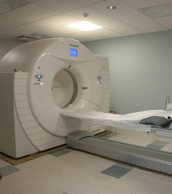 PET/CT scan machine provides an image displaying detailed heart structures for diagnosing conditions.